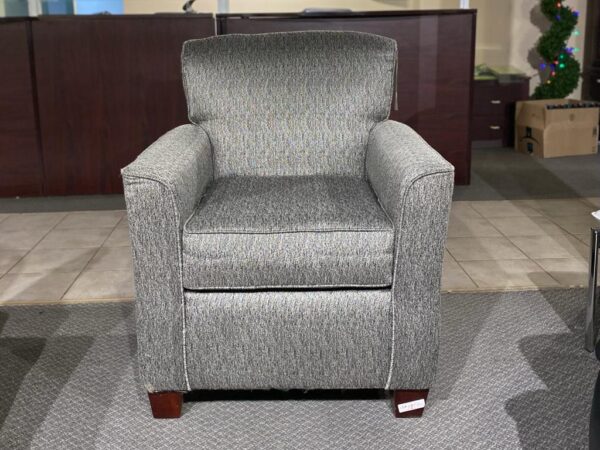 Elevate your space with our Grey Fabric Sofa Chair. The perfect blend of style and comfort, featuring brown legs for a touch of warmth. Discover affordable elegance during our sale! Ideal for cozy lounging or as a stylish accent piece in any room.